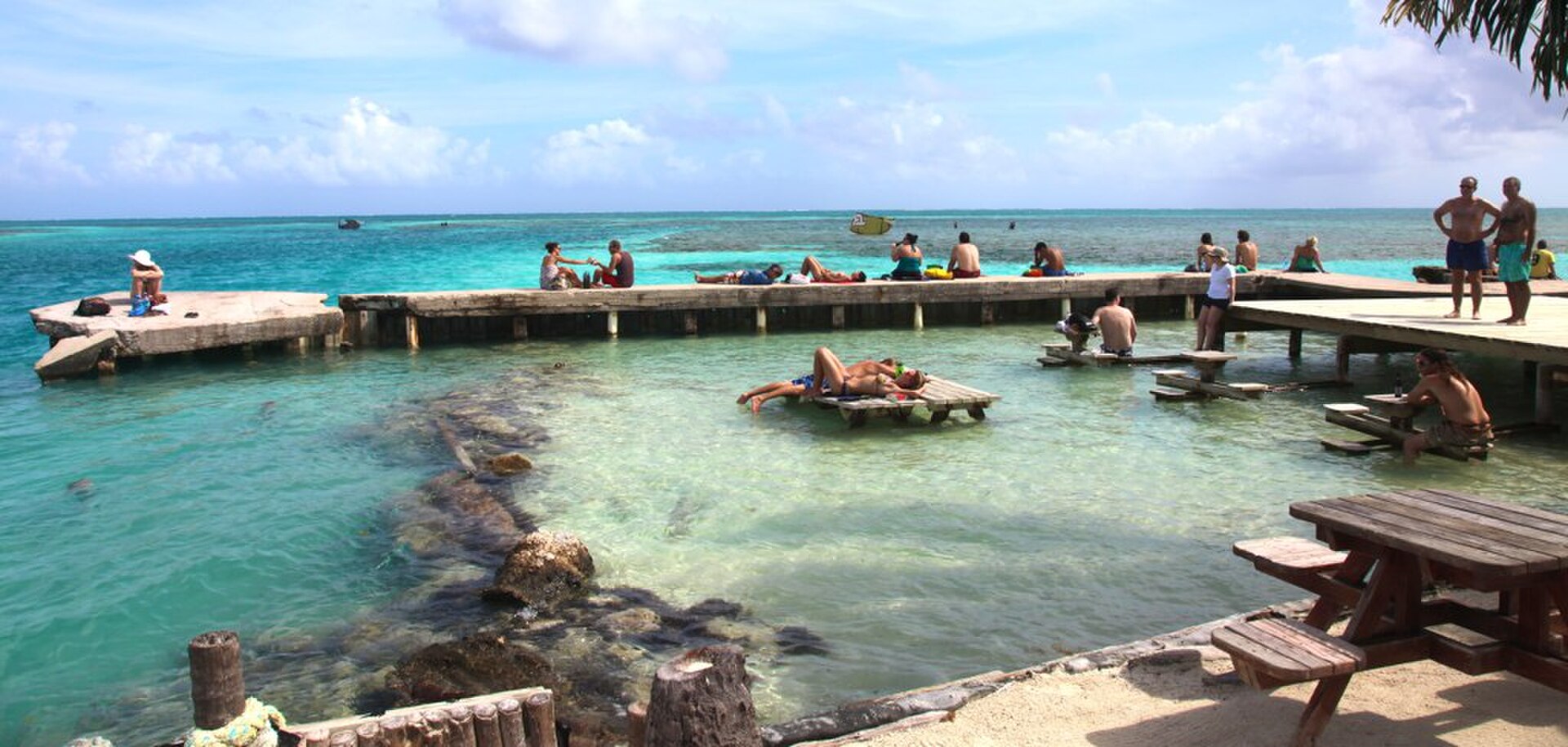 White sand beach and turquoise water at Caye Caulker Belize on a cruise passenger beach break shore excursion